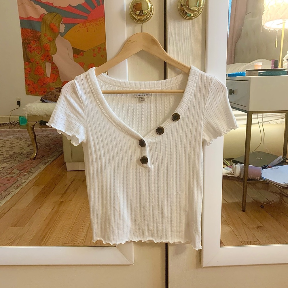AE Button Top
